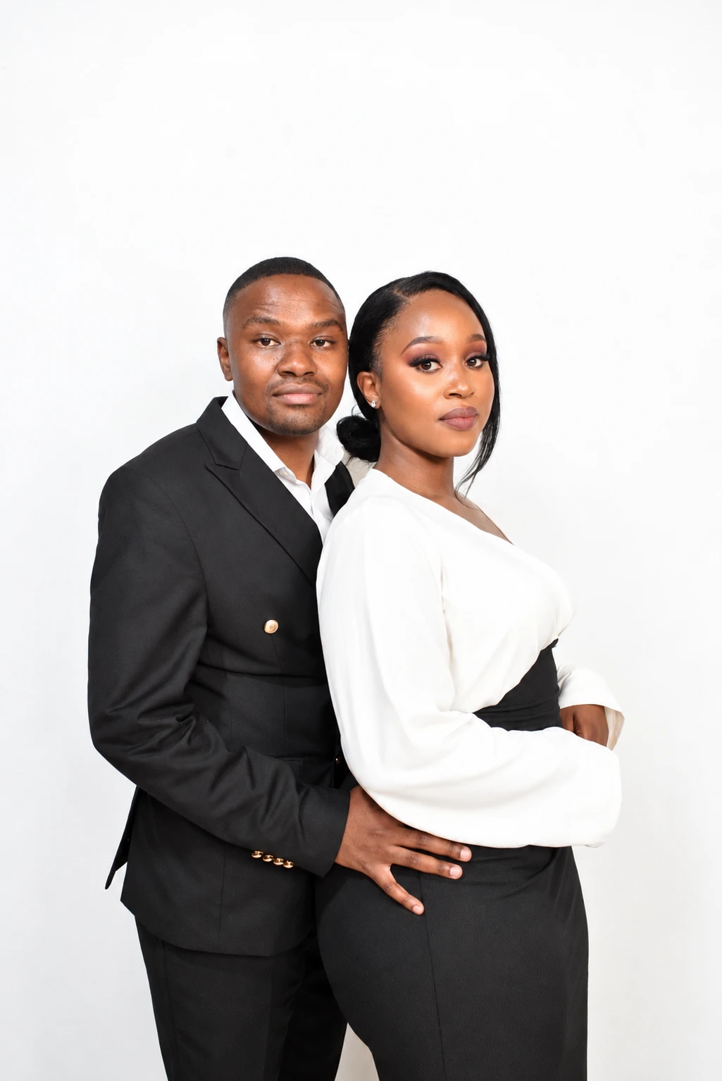 Ishmael and Princess Mbongwana standing together in formal wear